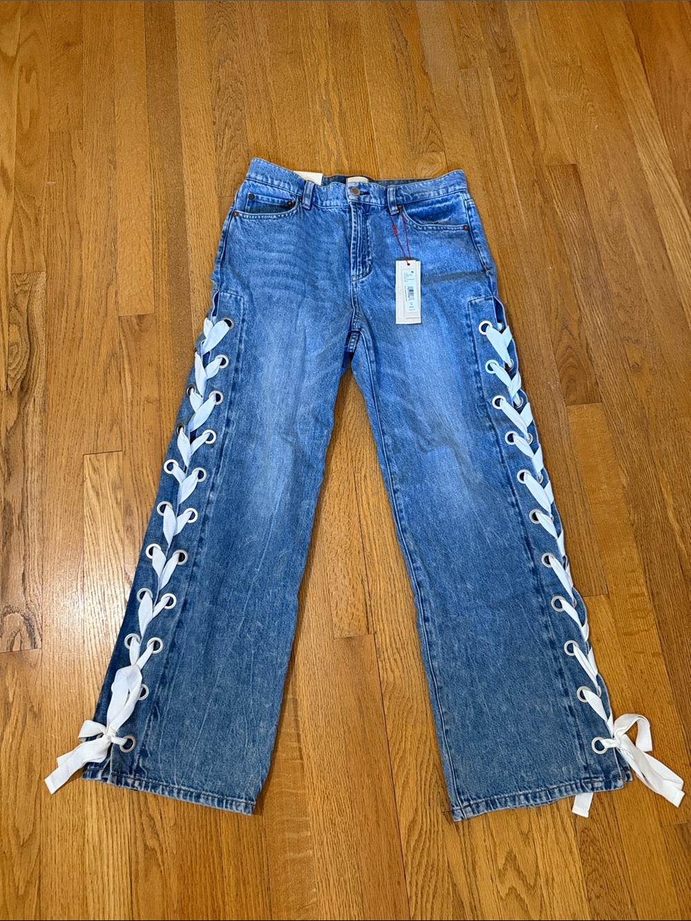Alice & Olivia lace up jeans